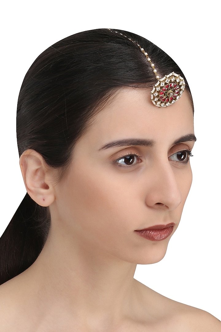 Gold finish green and red meena borla maangtikka available only at Pernia's Pop Up Shop.