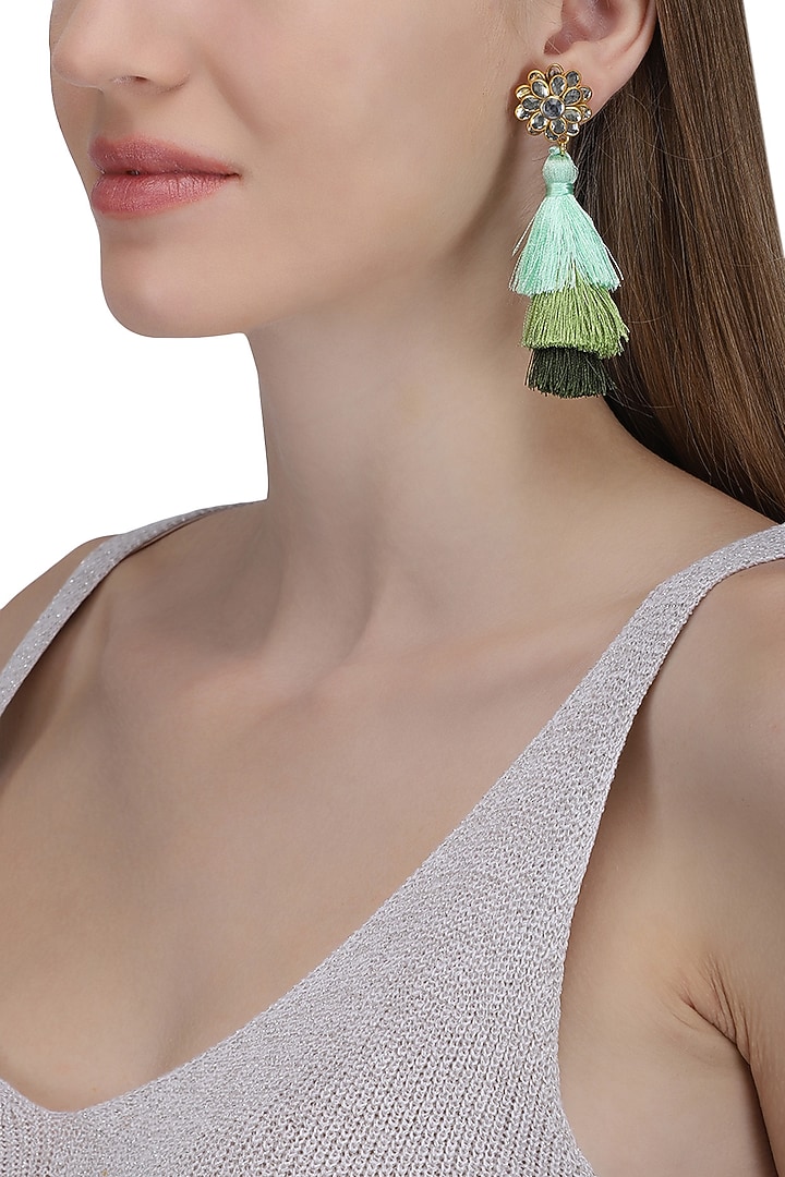 Gold plated hues of green tasseled earrings available only at Pernia's Pop Up Shop.