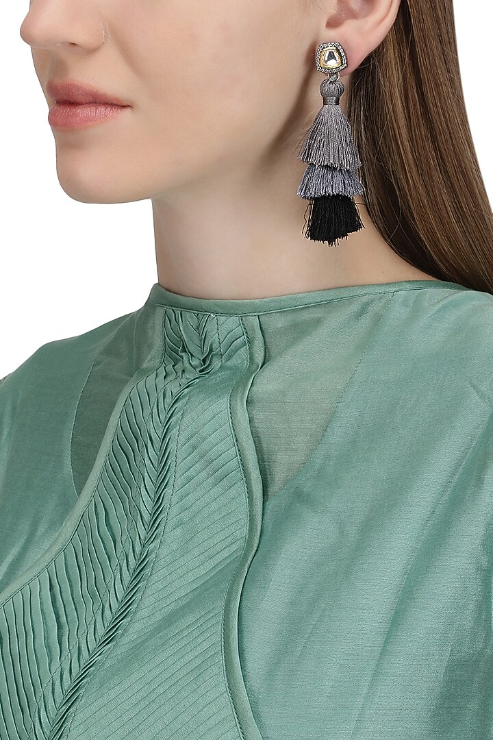 Gold plated grey and black tasseled earrings available only at Pernia's Pop Up Shop.
