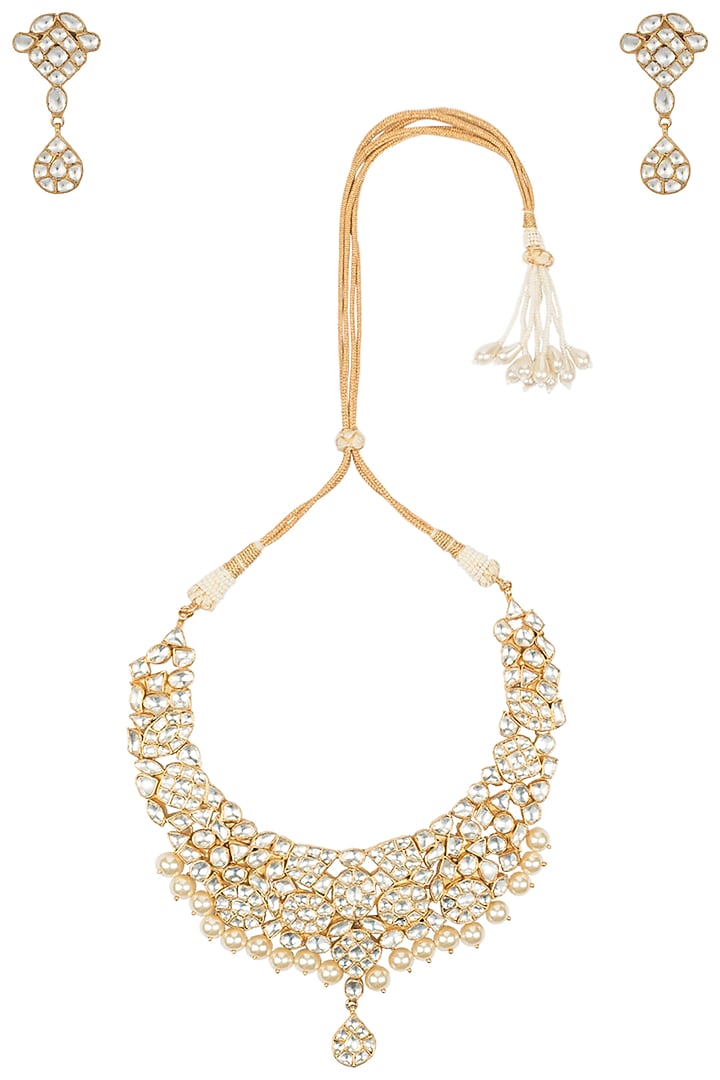 Gold plated white jadtar necklace set available only at Pernia's Pop Up Shop.