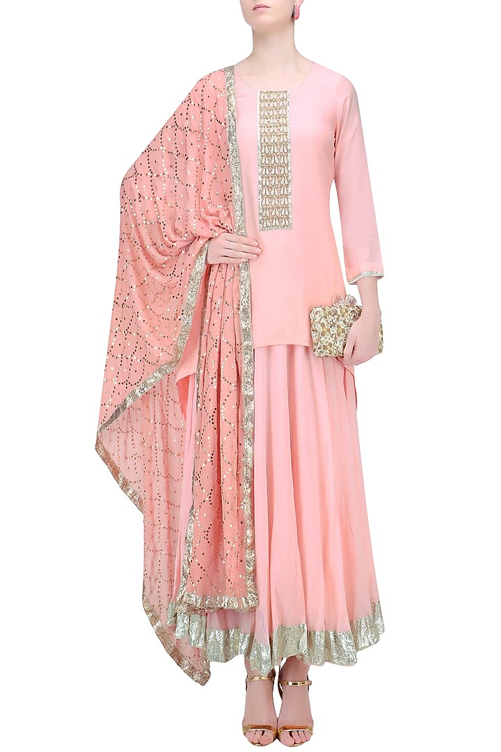 Nude pink pearl embroidered high low kurta and skirt set available only at Pernia's Pop Up Shop.