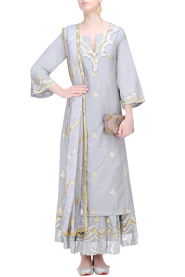 Light grey, gold and silver gota patti work kurta and skirt set available only at Pernia's Pop Up Shop.