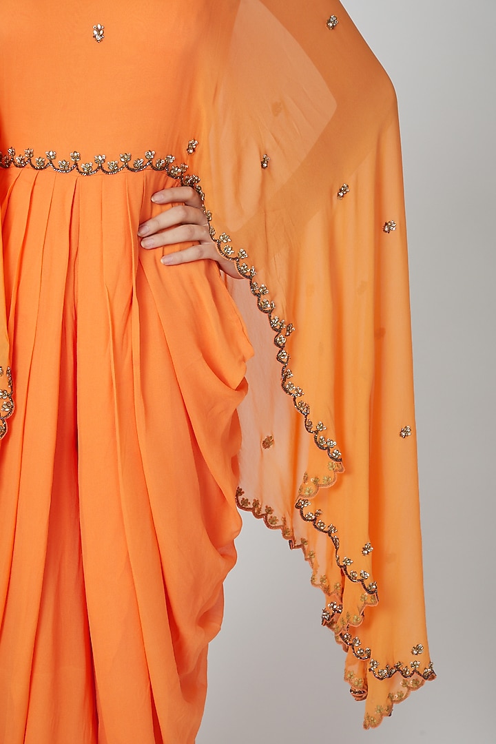 Orange Embroidered Jumpsuit With Cape by Rajat tangri at Pernia's Pop Up Shop