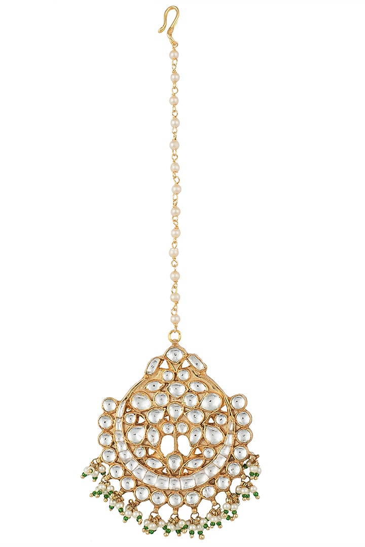 Gold plated green and white maang tikka by RIANA JEWELLERY at Pernia's Pop Up Shop