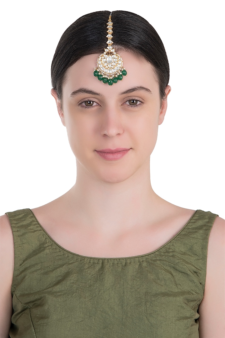 Gold plated white and green drops jadtar maang tikka by RIANA JEWELLERY