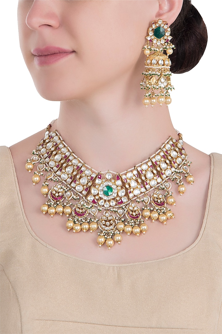 Gold plated jodhpur style green stone necklace set by RIANA JEWELLERY