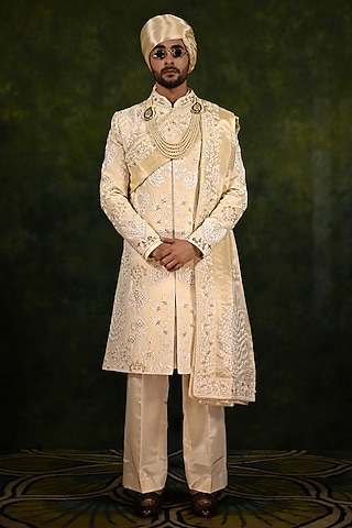 Ivory Gold Tissue Zari Crepe Thread Work Sherwani Set by Rachit Khanna Men