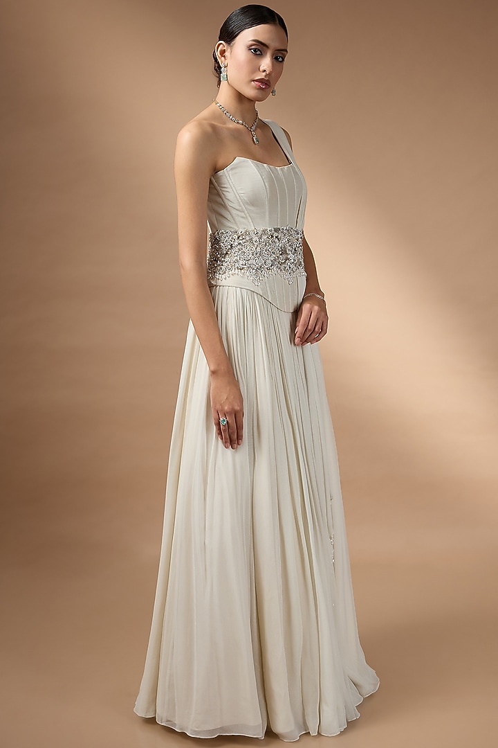 Ivory Metallic Georgette Embroidered Draped Skirt Set by Rocky Star at Pernia's Pop Up Shop