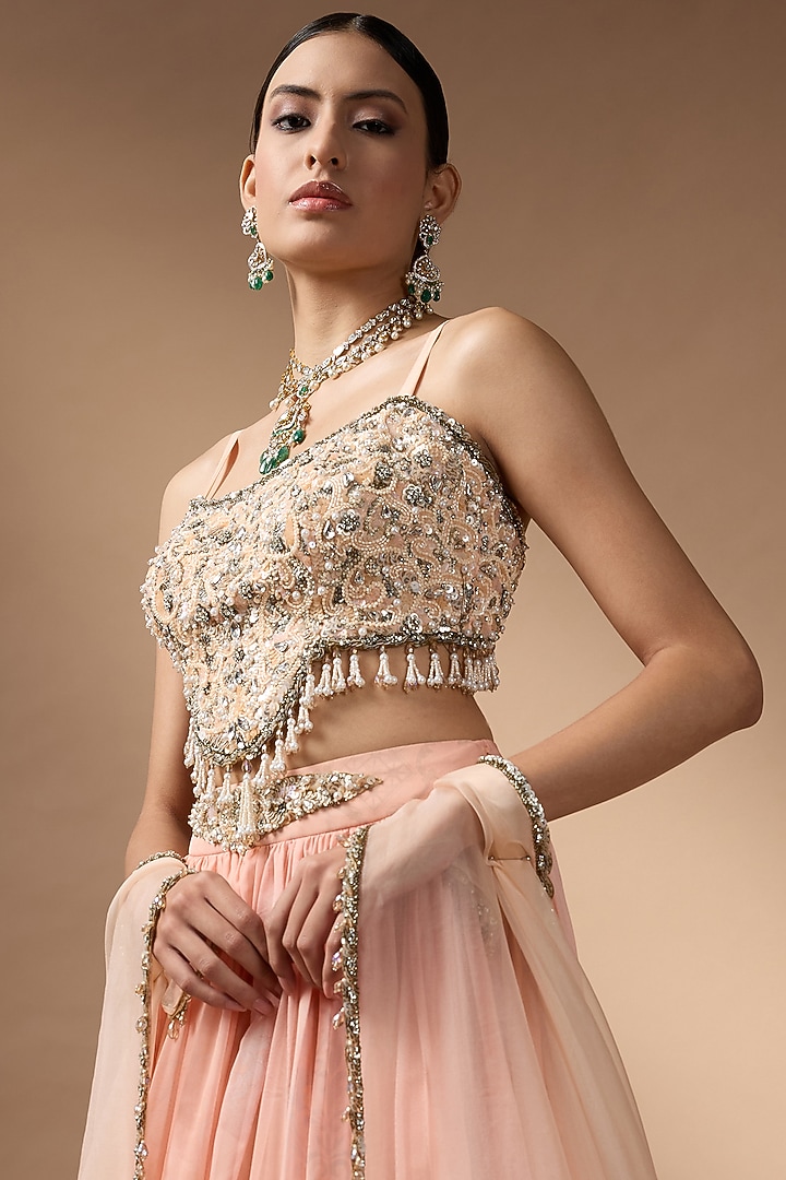 Orange Raw Silk Printed Pleated Wedding Lehenga Set by Rocky Star at Pernia's Pop Up Shop