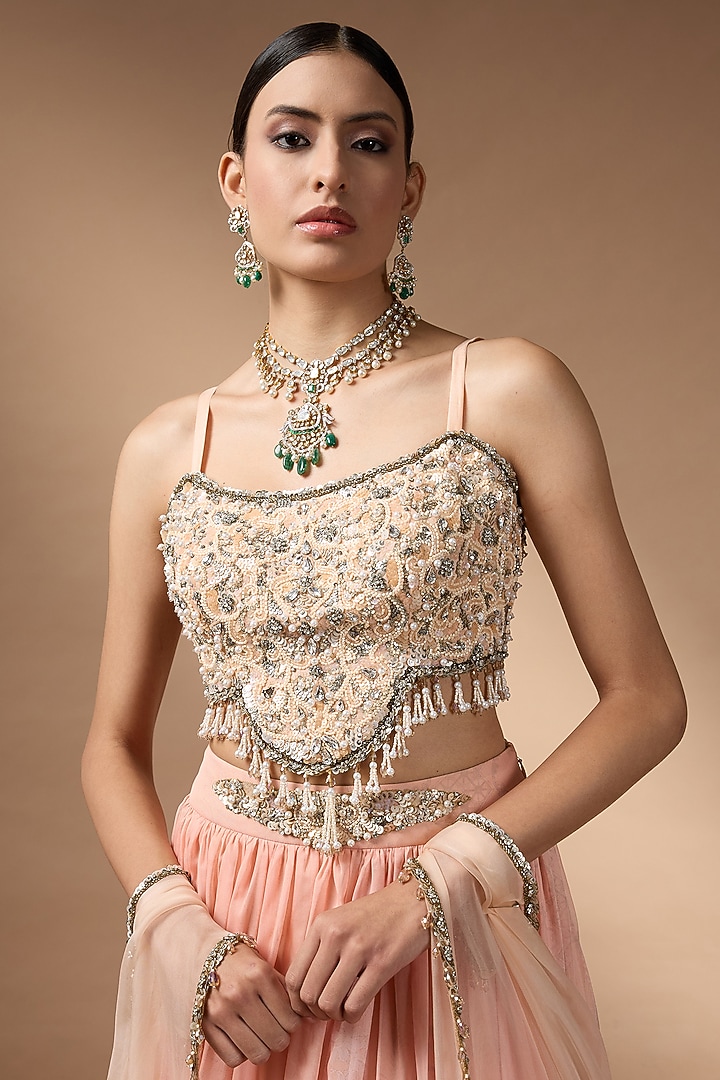 Orange Raw Silk Printed Pleated Wedding Lehenga Set by Rocky Star at Pernia's Pop Up Shop