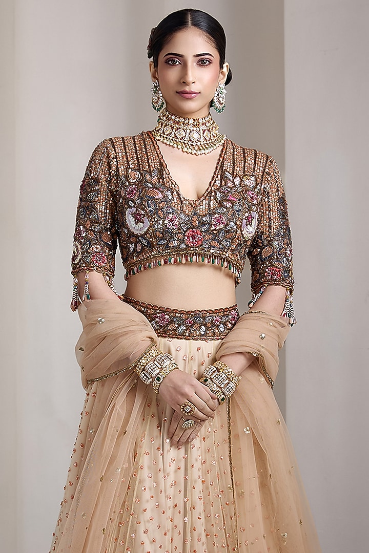 Beige Net Patchwork Embellished Bridal Lehenga Set by Rocky Star at Pernia's Pop Up Shop
