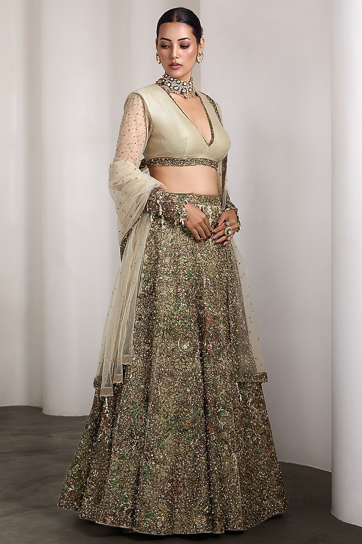 Ivory Raw Silk & Net Embellished Bridal Lehenga Set by Rocky Star at Pernia's Pop Up Shop