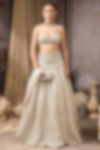 Ivory Raw Silk & Net Embroidered Ruffled Bridal Lehenga Set by Rocky Star at Pernia's Pop Up Shop