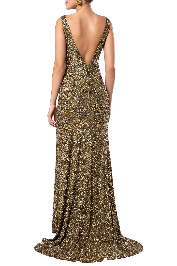 Golden open back trail gown available only at Pernia's Pop Up Shop.