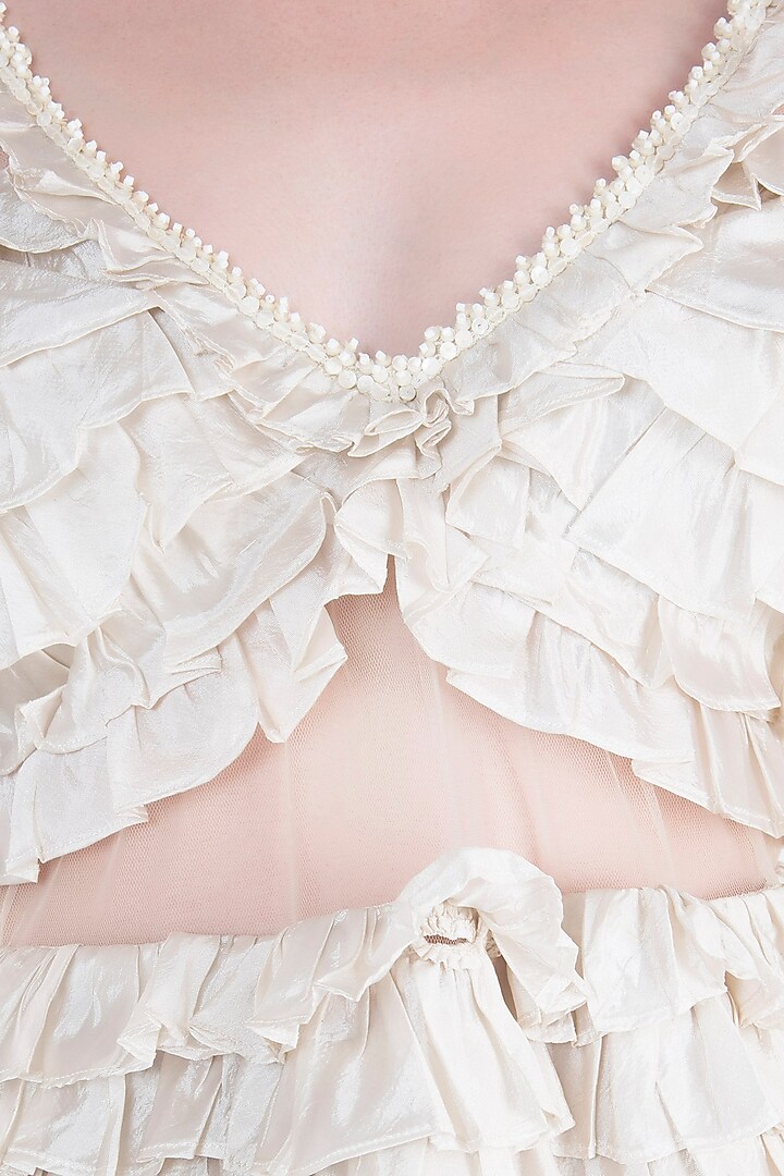 Ivory shell button frill dress available only at Pernia's Pop Up Shop.