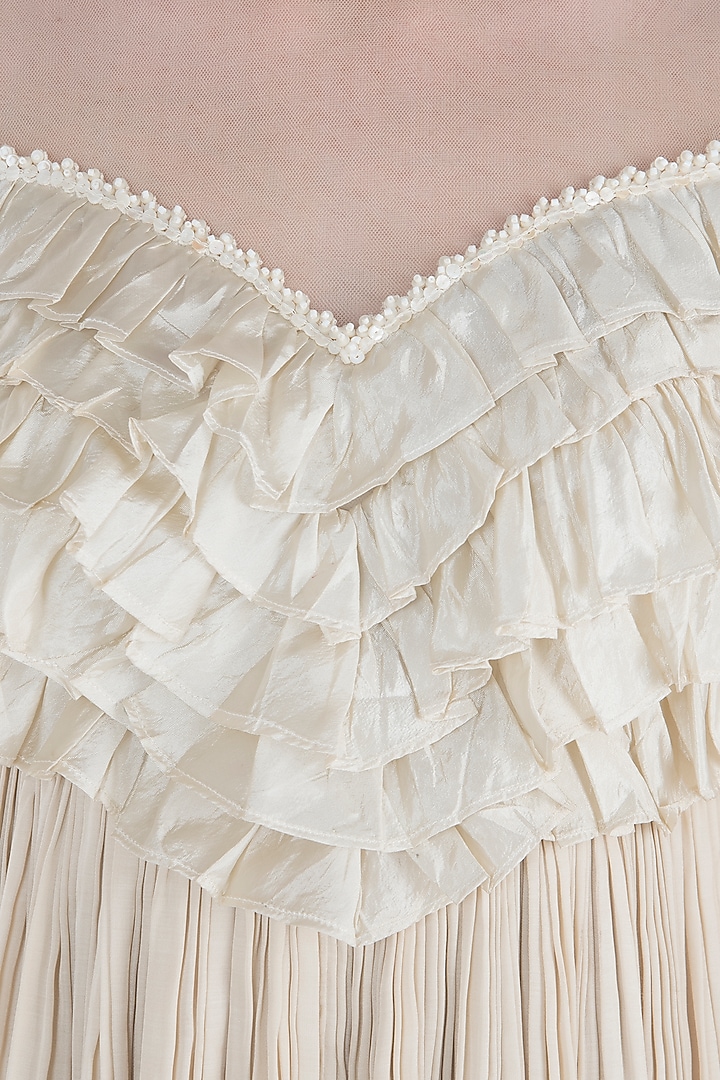 Ivory shell button frill tunic available only at Pernia's Pop Up Shop.