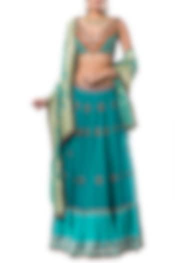 Turquoise embroidered lehenga set by Rocky Star