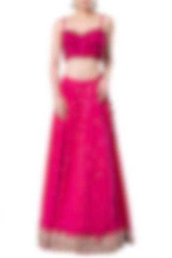 Hot pink embroidered crop top with lehenga skirt by Rocky Star