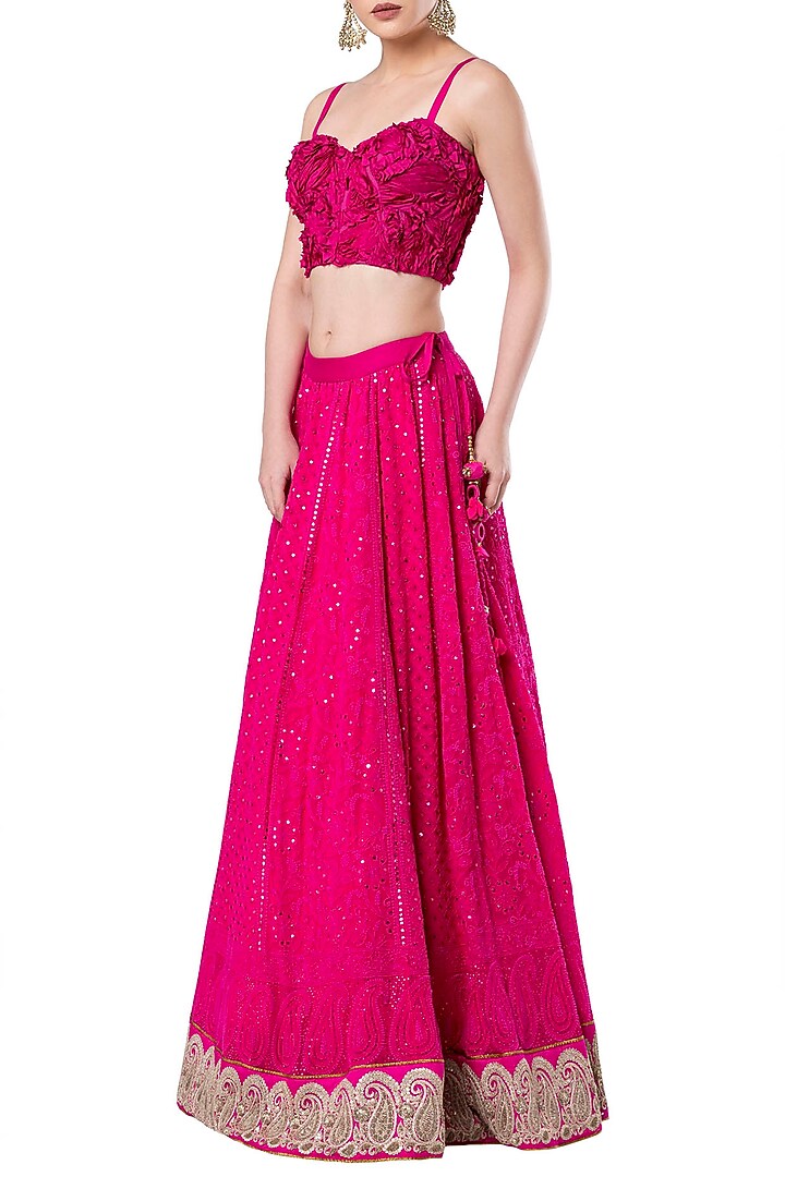 Hot pink embroidered crop top with lehenga skirt available only at Pernia's Pop Up Shop.