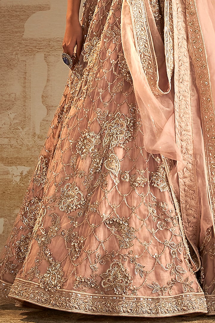 Dusky Pink Net Applique Embroidered Bridal Lehenga Set by Ridhi Mehra at Pernia's Pop Up Shop