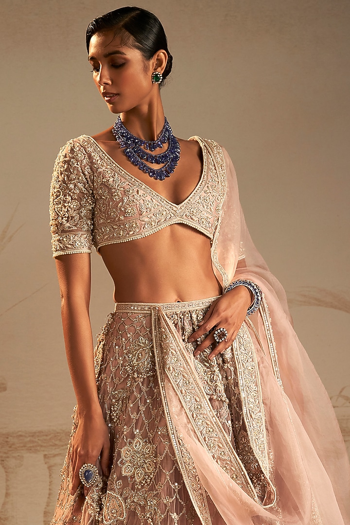 Dusky Pink Net Applique Embroidered Bridal Lehenga Set by Ridhi Mehra at Pernia's Pop Up Shop