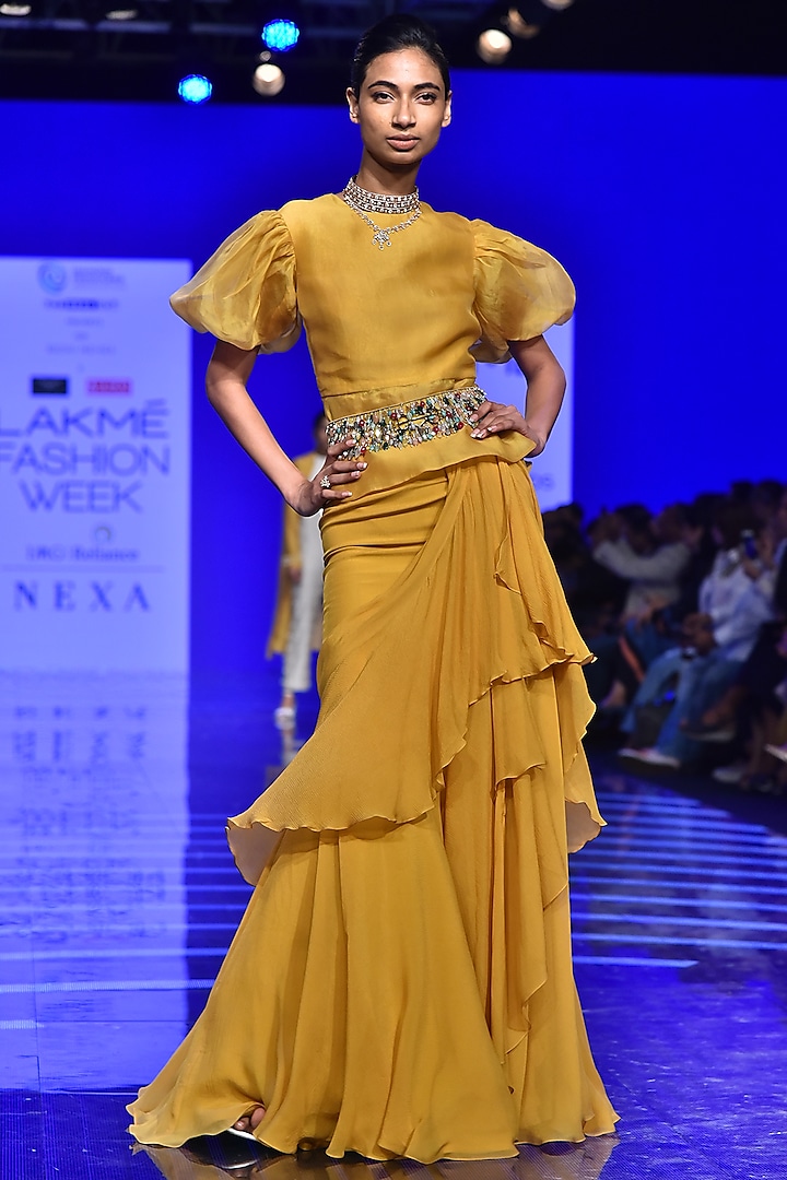 Mustard Shirt With Ruffled Skirt & Embellished Belt by Ridhi Mehra