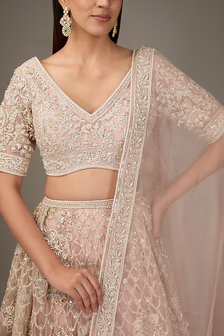 Dusty Pink Net Applique Embroidered Bridal Lehenga Set by Ridhi Mehra at Pernia's Pop Up Shop