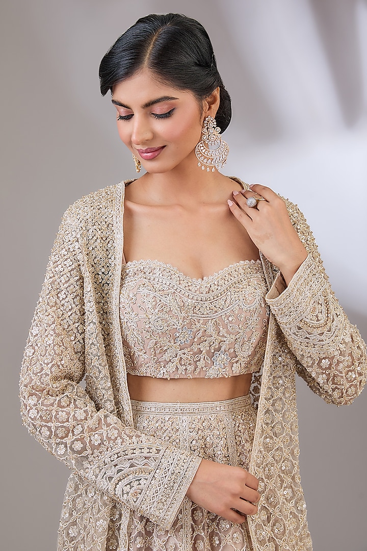 Champagne Net Floral Motif Embroidered Jacket Bridal Lehenga Set by Ridhi Mehra at Pernia's Pop Up Shop