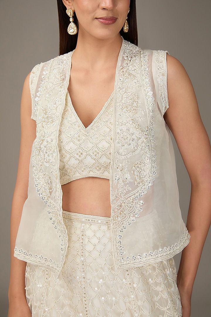 Ivory Net Thread Embroidered Jacket Bridal Lehenga Set by Ridhi Mehra at Pernia's Pop Up Shop