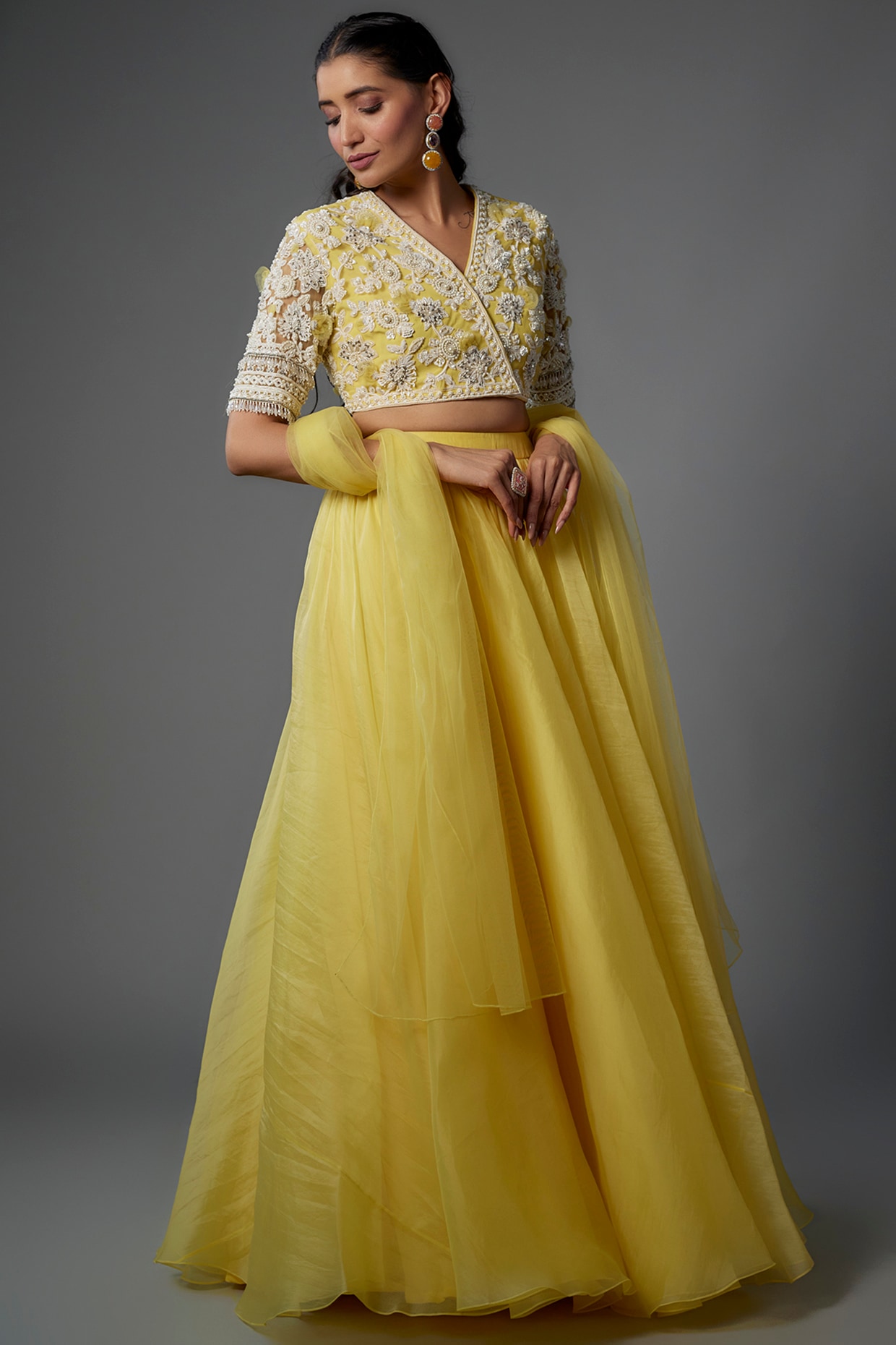This Yellow lehenga with green crop top brings out the sparkle in you and  yet keep your look elegant !! #Yellow #brightcolor #Bridesmaid  #Friendsofthebride #Leh…