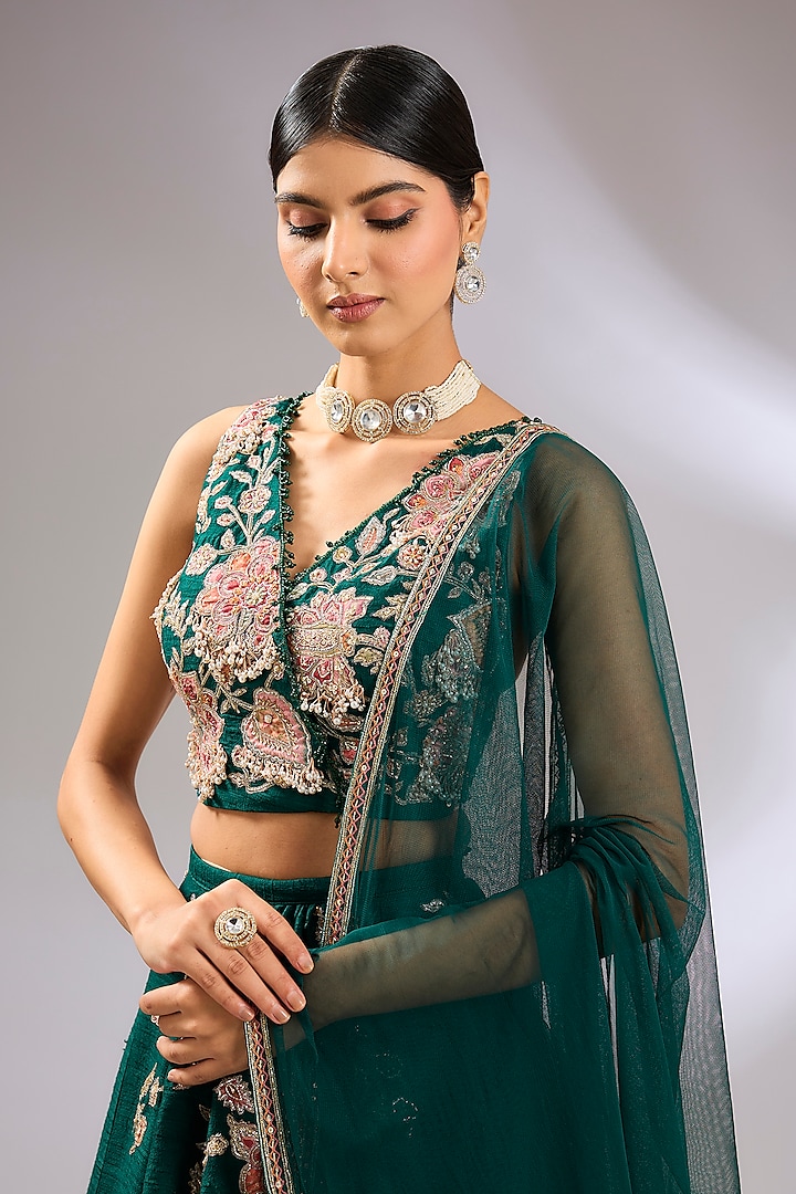 Emerald Green Raw Silk Floral Embroidered Bridal Lehenga Set by Ridhi Mehra at Pernia's Pop Up Shop