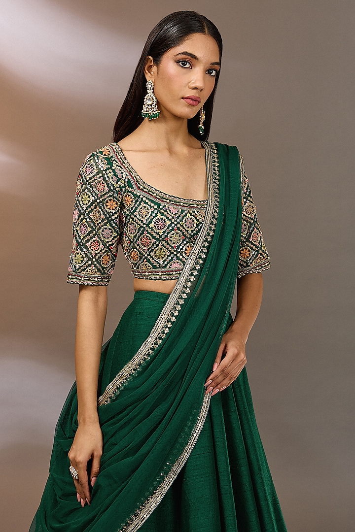 Emerald Green Raw Silk Embroidered Bridal Lehenga Set by Ridhi Mehra at Pernia's Pop Up Shop