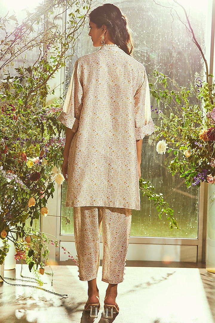 Off-White Printed Pleated Straight Pants by Ridhi Mehra Pret at Pernia's Pop Up Shop