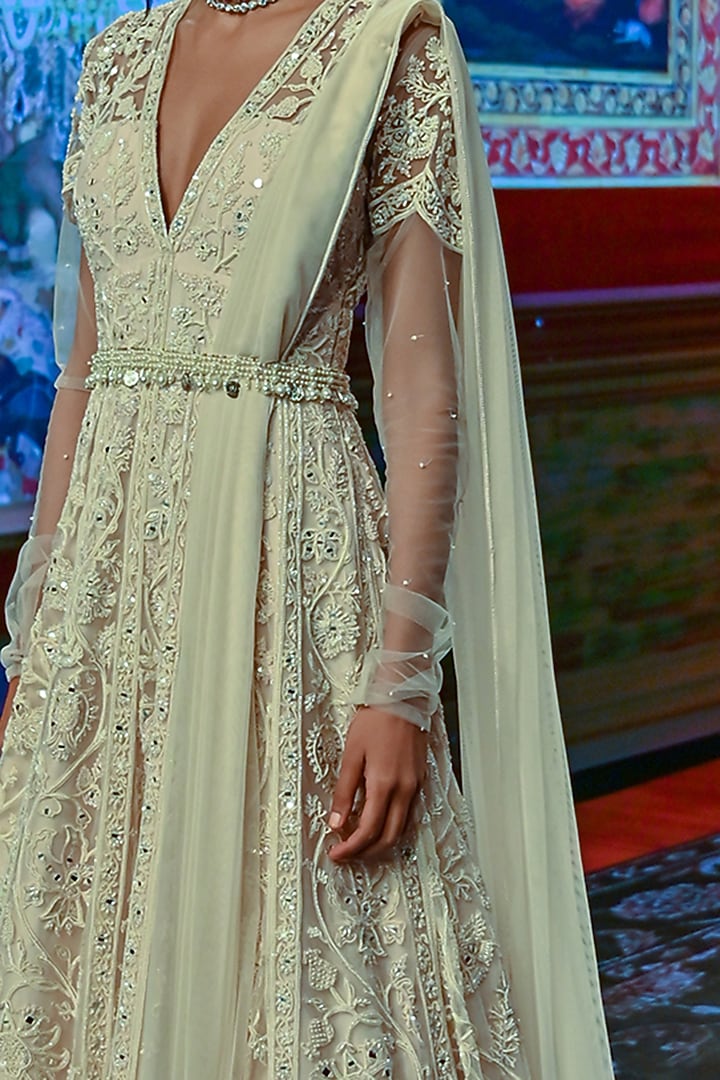Ivory Embroidered Bridal Anarkali With Belt & Dupatta by Ridhi Mehra at Pernia's Pop Up Shop