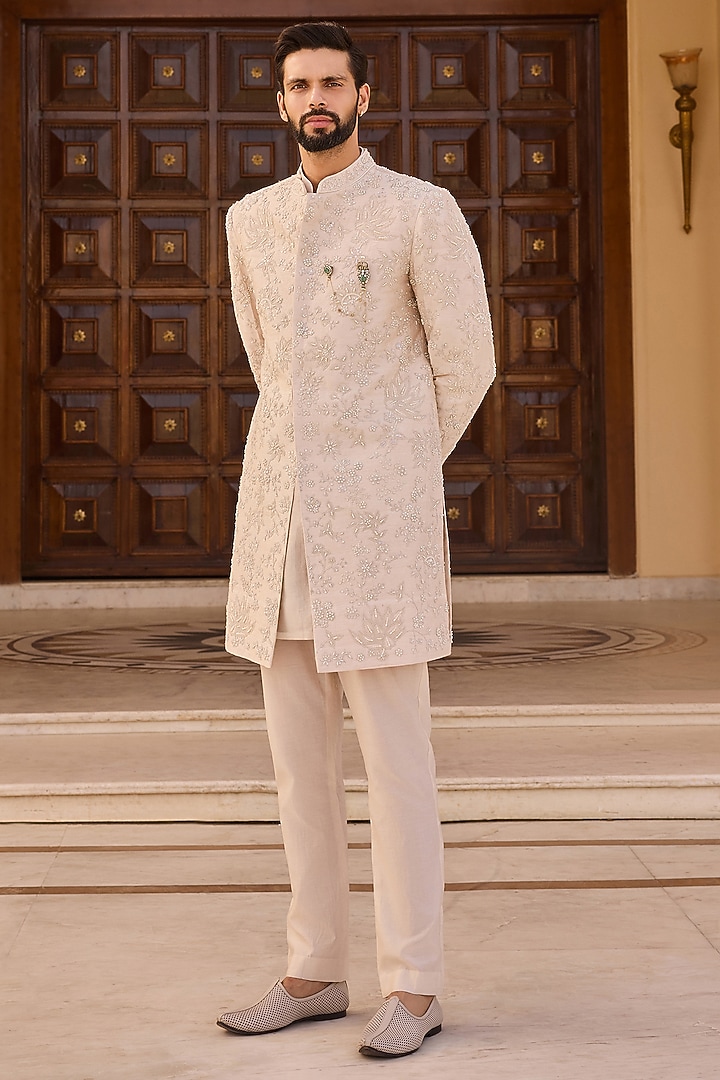 Salt Ivory Raw Silk Embroidered Groom Sherwani Set by Ridhi Mehra Men at Pernia's Pop Up Shop