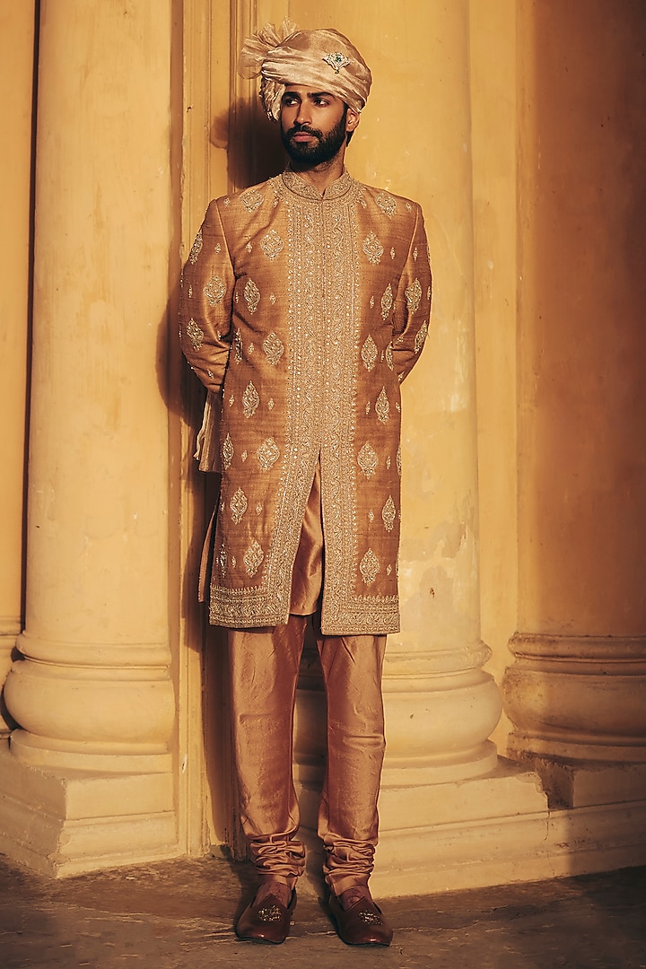 Deep Gold Raw Silk Embroidered Groom Sherwani Set by Ridhi Mehra Men at Pernia's Pop Up Shop
