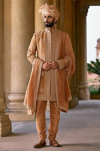 Deep Gold Raw Silk Embroidered Sherwani Set by Ridhi Mehra Men