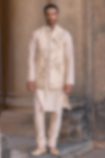Light Beige Raw Silk Embroidered Bundi Jacket Set by Ridhi Mehra Men at Pernia's Pop Up Shop