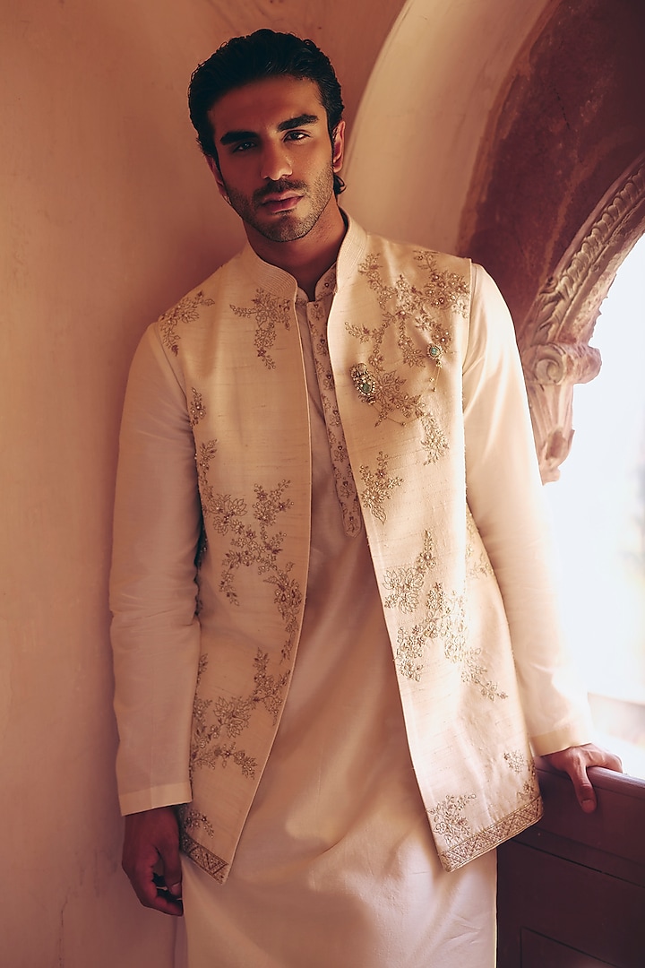 Light Beige Raw Silk Embroidered Bundi Jacket Set by Ridhi Mehra Men at Pernia's Pop Up Shop