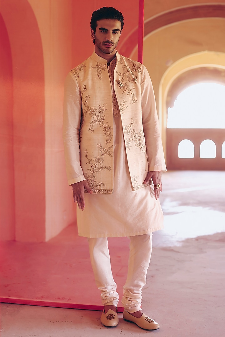 Light Beige Raw Silk Embroidered Bundi Jacket Set by Ridhi Mehra Men at Pernia's Pop Up Shop