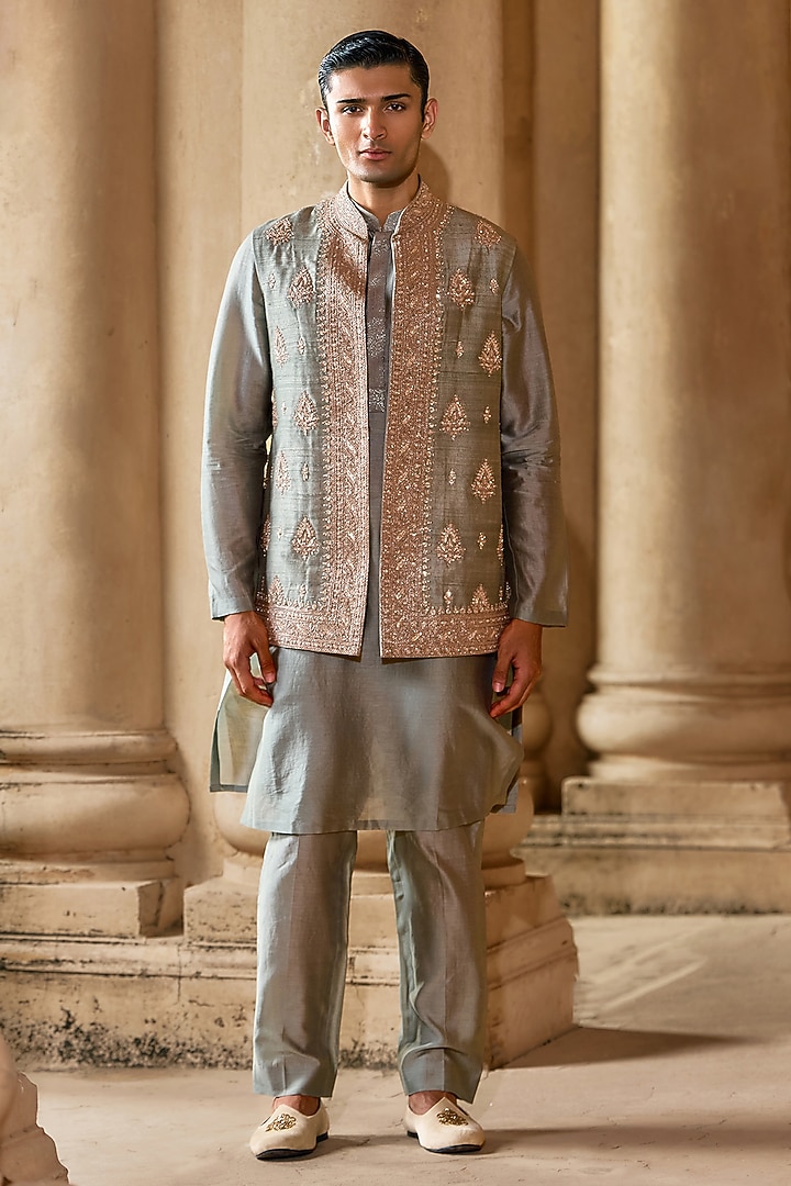 Powder Blue Raw Silk Embroidered Bundi Jacket Set by Ridhi Mehra Men at Pernia's Pop Up Shop