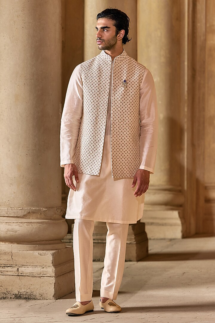 Light Beige Raw Silk Embroidered Bundi Jacket Set by Ridhi Mehra Men at Pernia's Pop Up Shop