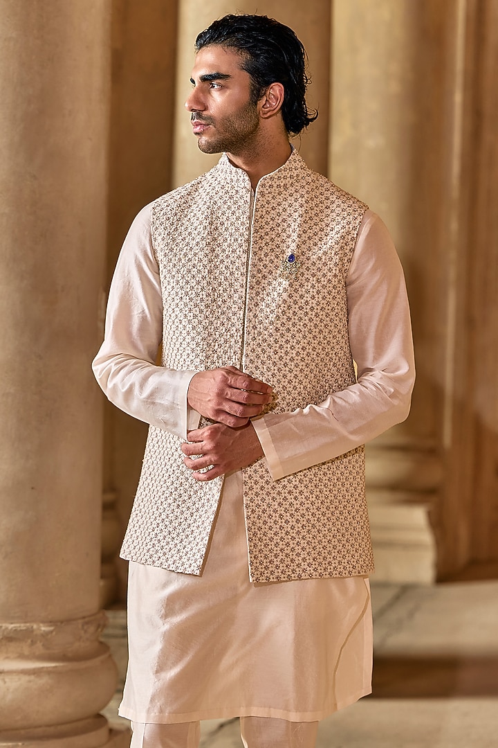 Light Beige Raw Silk Embroidered Bundi Jacket Set by Ridhi Mehra Men at Pernia's Pop Up Shop