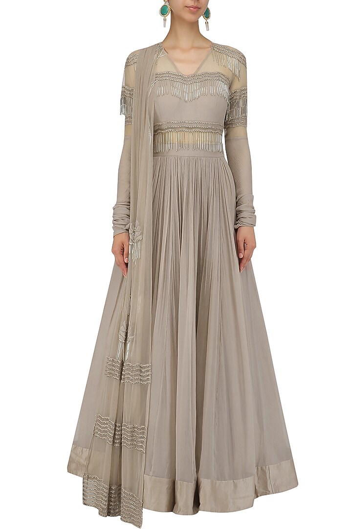 Champagne gold tasseled anarakali with attached dupatta available only at Pernia's Pop Up Shop.