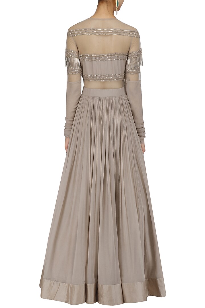 Champagne gold tasseled anarakali with attached dupatta available only at Pernia's Pop Up Shop.