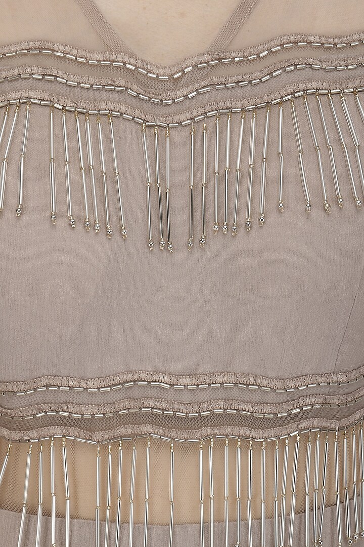 Champagne gold tasseled anarakali with attached dupatta available only at Pernia's Pop Up Shop.