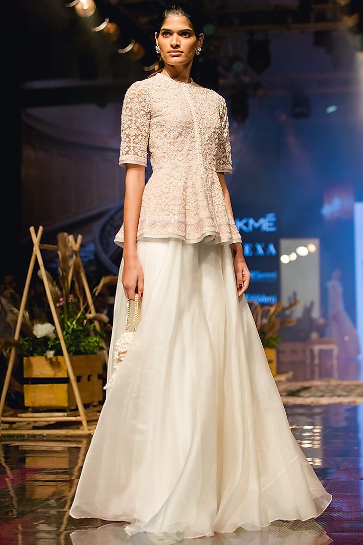 Ivory Sharara Pants With Champagne Embroidered Peplum Top by Ridhi Mehra