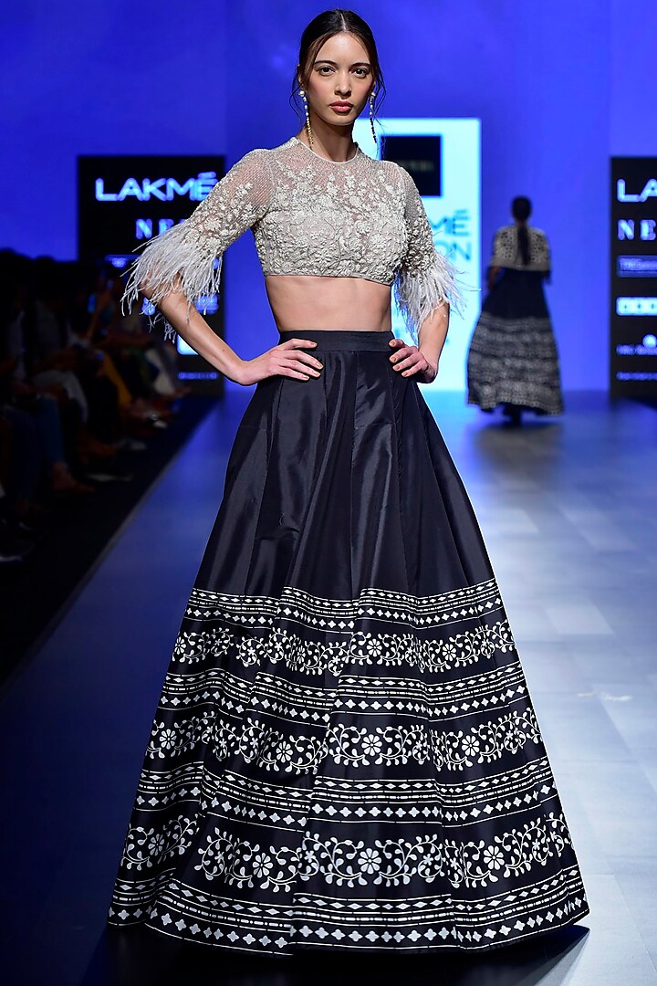 Ivory Embroidered Blouse with Black Lehenga by Ridhi Mehra