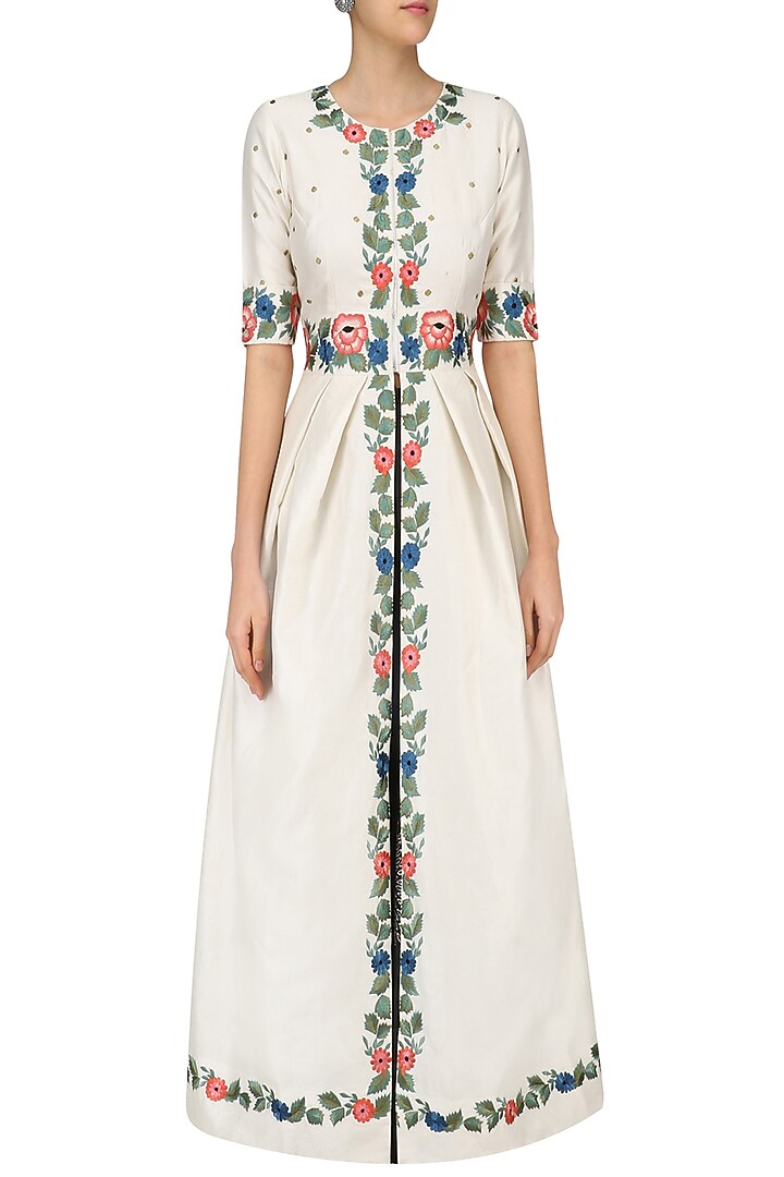 White floral embroidered tunic with black block print skirt available only at Pernia's Pop Up Shop.