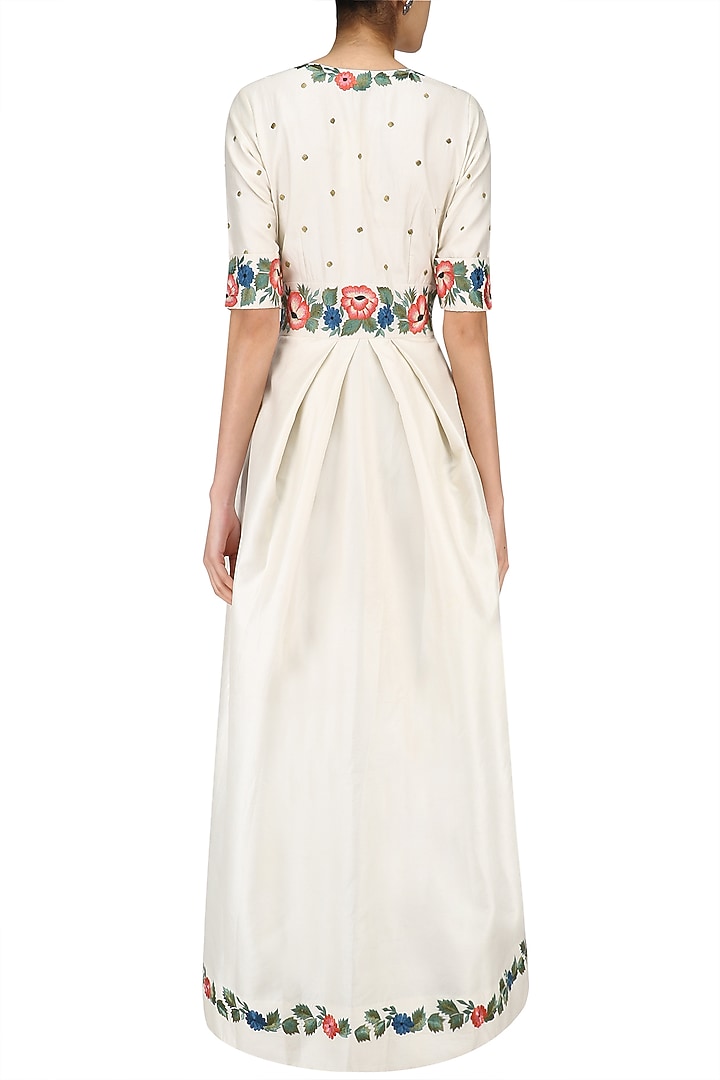 White floral embroidered tunic with black block print skirt available only at Pernia's Pop Up Shop.